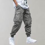 Tomáš – Pánske Cargo Joggingové Nohavice – Fialové Streetwear Nohavice s Kapsami na Zips a Náplety