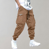 Tomáš – Pánske Cargo Joggingové Nohavice – Fialové Streetwear Nohavice s Kapsami na Zips a Náplety